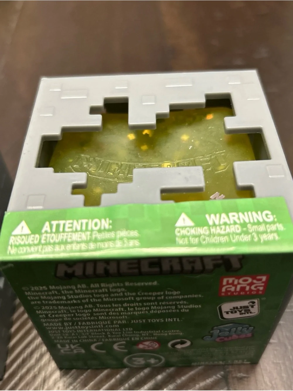 2 Minecraft Jelly Cubes.  Purple and Yellow.